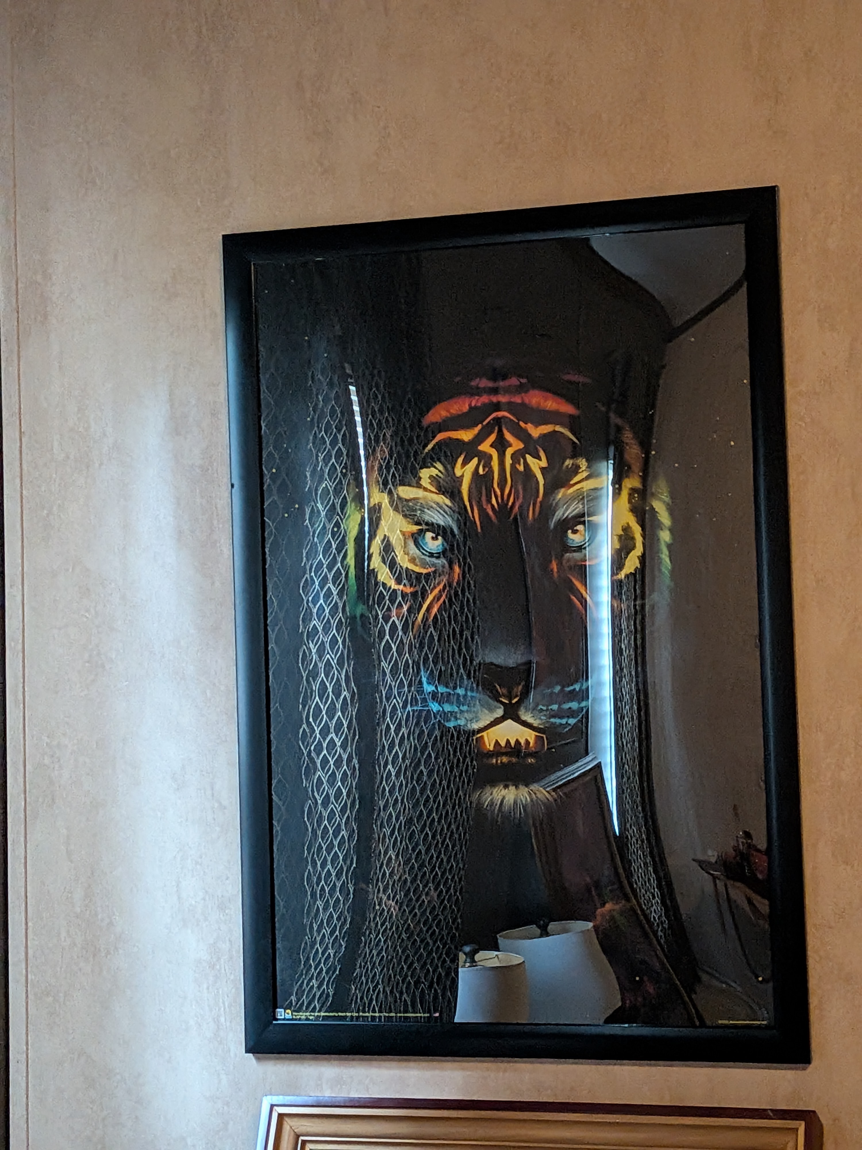 Frame and hang black‑light poster 2